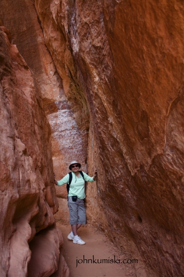 Wonder Woman in a narrow cut in Zion Canyon.