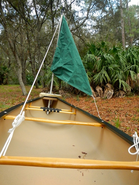 rigging a temporary sail for a canoe