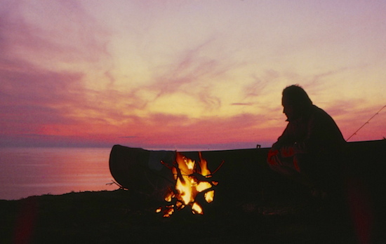 Ken Shannon tends the campfire in Everglades National Park.